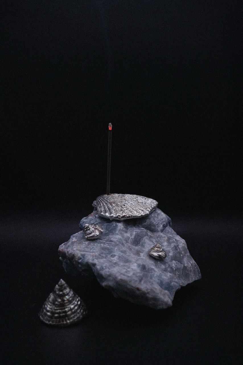 MARE is a handmade incense vessel: native Florida shells cast in tin-copper, joined to 4-5" blue calcite. Each piece is unique and includes Japanese incense. Sculptural functional art for the home.